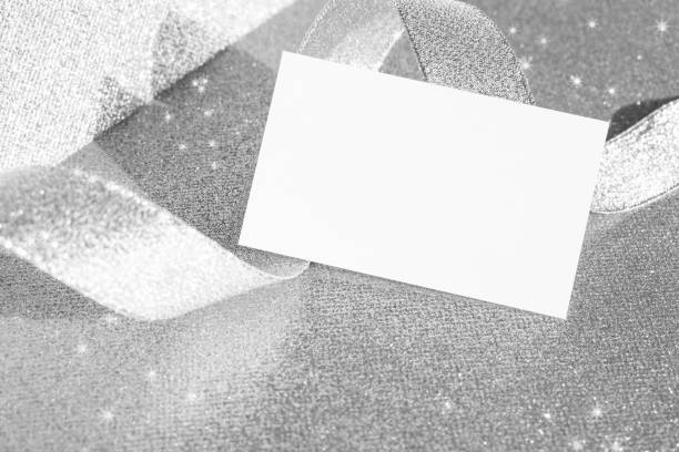 Business card mock-up on glitter silver background