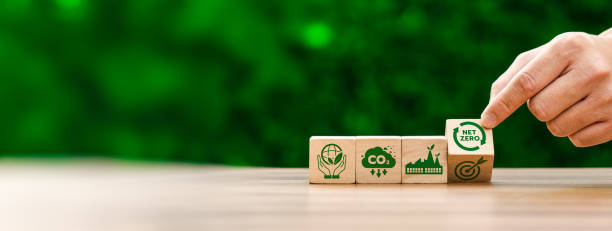 istock Sustainable Development and Carbon Neutrality Concept with Wooden Blocks Illustrating Environmental Goals, Net Zero Emissions, Carbon Reduction, Green Energy, and Eco-Friendly Practices 2181436565