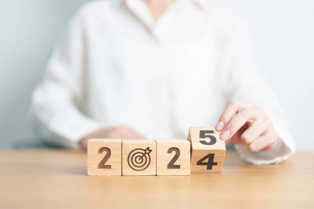 istock 2024 year change to 2025 year block with dartboard icon. Goal, Target, Resolution, strategy, plan, Action, mission, motivation, and New Year start concepts 2181439564