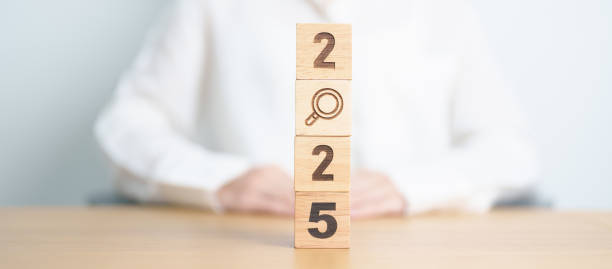 istock 2025 block with magnifying glass icon. SEO, Search Engine Optimization, hiring , Advertising, Idea, Strategy, marketing, Keyword, Content and New Year start concepts 2181439608