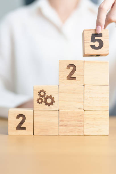 istock 2025 year block with gear icon. Business Process, Team, teamwork, Goal, Target, Resolution, strategy, plan, Action, motivation, change, brainstorm and New Year start concepts 2181439624