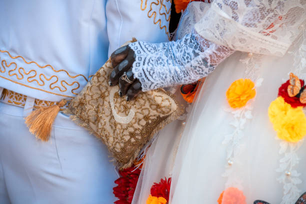 istock A women holds a purse while wearing a Catrina costume 2181441403