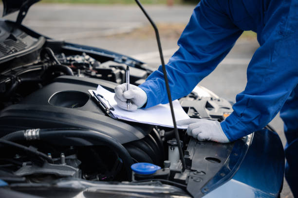 istock Mechanic repairing car 2181441995