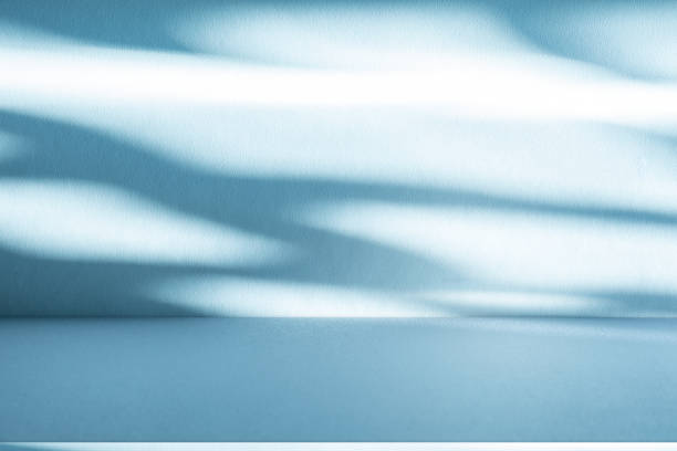 istock Studio style background wall decoration presentation uses white and blue tones. with shadows cast from a nearby window, concept creating a decorative 2181445198