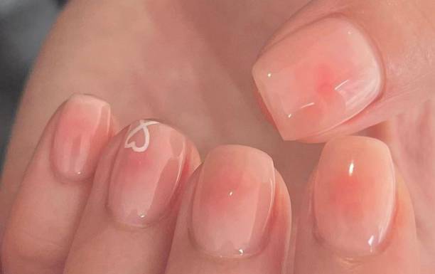 istock Creative nail art featuring intricate designs, vibrant colors, and unique patterns. Perfect for beauty and fashion photography, showcasing trends in nail designs and the artistry of manicure techniques. 2181448556