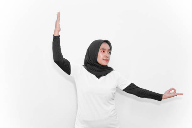 istock Warm-up exercises performed by women wearing hijabs 2181448974