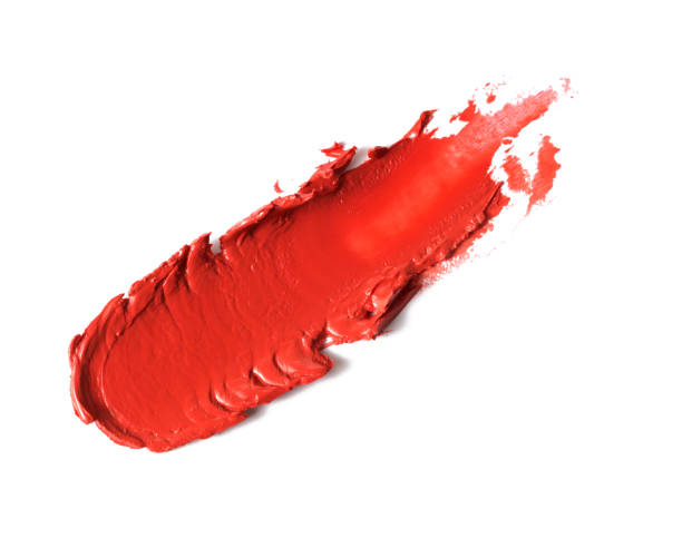 istock Smudged orange color lipstick on background 2181450561