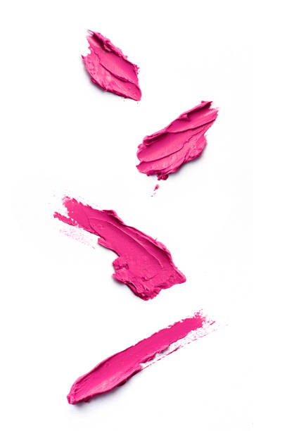Smudged pink color lipstick on background