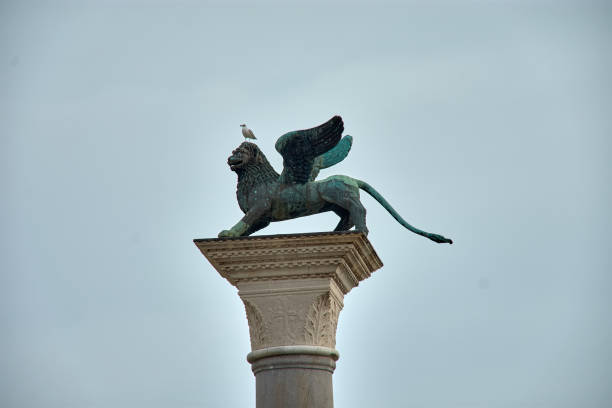 Venice, Veneto, Italy: Saint Mark flanked by angels over the central lunette, with the winged lion, holding a book with the angelic salutation of the praedestinatio: \