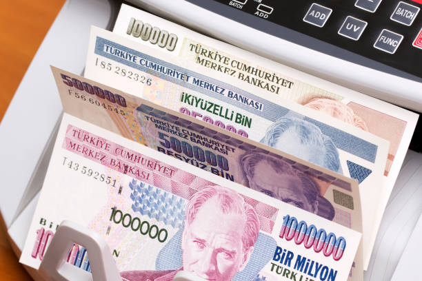 istock Old Turkish Lira in the counting machine 2181454551