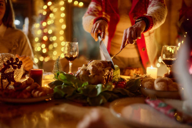 Cutting roasted chicken on Christmas Eve!