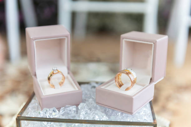 istock Wedding ring set in a pink ring box on a white background. 2181455479