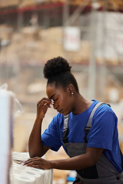 istock Black female worker having a headache in supply chain. 2181455516