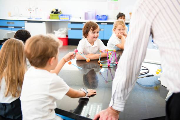 istock Children in a science classroom, engaged in learning. 2181455790