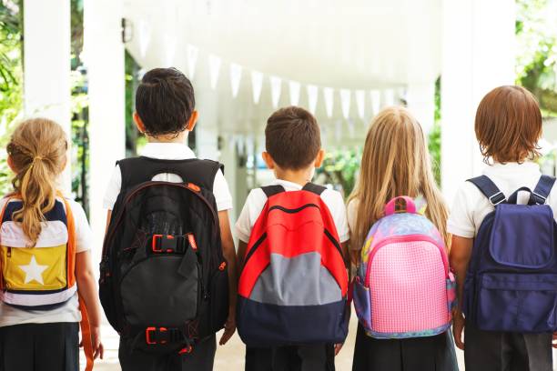 istock Back to school. Diverse students with backpacks, boys and girls. 2181455854