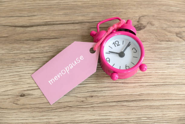 istock Awareness and Empowerment: The Pink Alarm Clock Symbolizing Menopause Conversations 2181456270