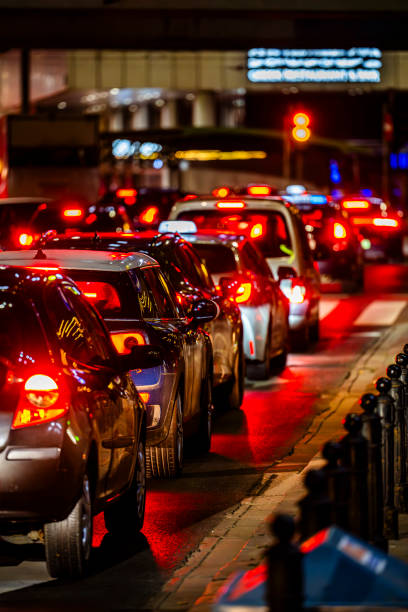 istock Cars waiting at a red light in a traffic jam. 2181457006