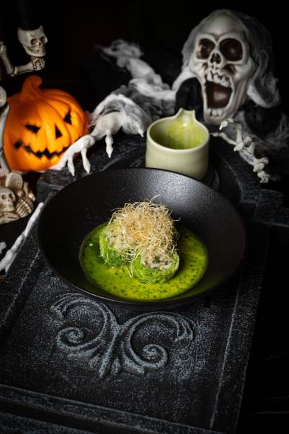 istock Halloween-themed gourmet dish with spooky decor. 2181458357