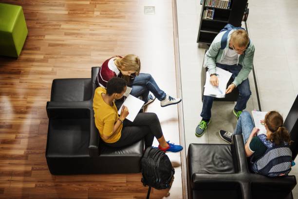 istock Group of young students studying together. 2181458693