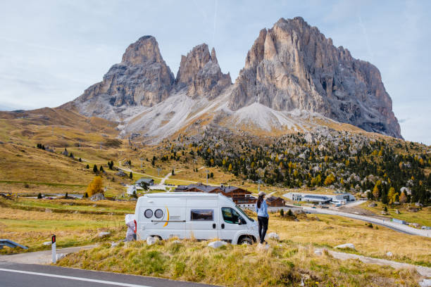 istock Exploring the breathtaking Dolomites in a camper van on a crisp autumn day 2181459547