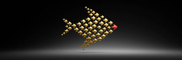 Golden Origami style fish swarm with red leader - 3D illustration with copy space