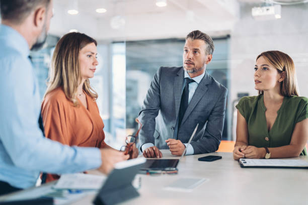 istock Taking important business decisions together 2181461167
