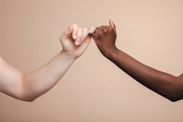 istock Two hands making a pinky promise, symbolizing trust and friendship. 2181462738