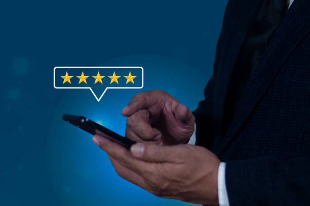 istock Businessman give five-star icon for feedback review satisfaction service, Customer service experience and business satisfaction survey. 2181463382