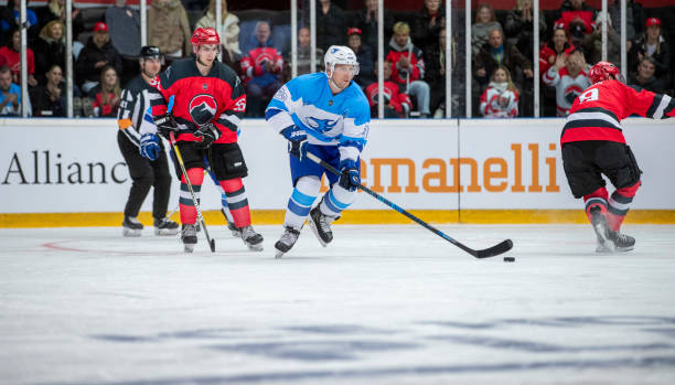 istock Ice Hockey Players Competing on the Ice 2181463648