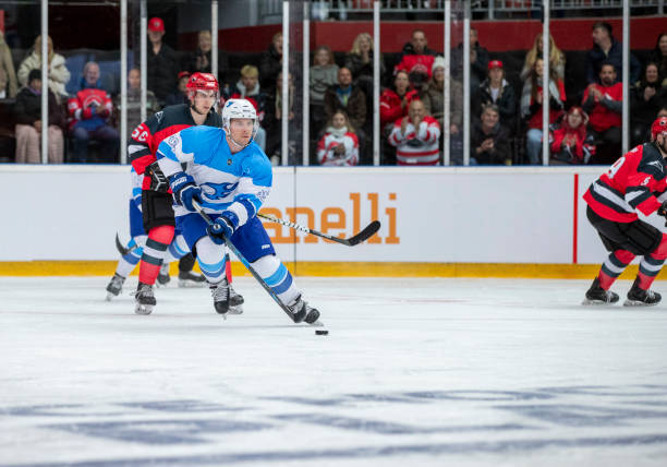 istock Ice Hockey Players in High-Speed Play 2181463717