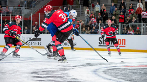 istock Intense Battle for Puck Leads to Powerful Bodycheck 2181463725