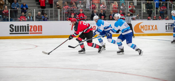 istock Intense Ice Hockey Pursuit on the Rink 2181463755