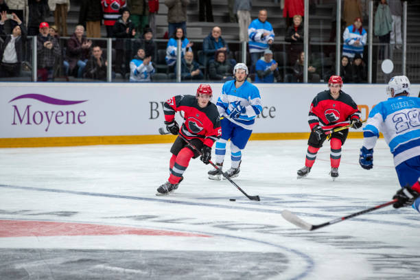 istock Ice Hockey Players Competing for Puck Control 2181463805