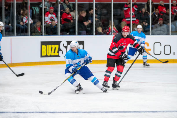 istock Ice Hockey Players in Competitive Duel on Ice 2181463829