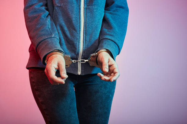 istock Woman in handcuffs 2181463831