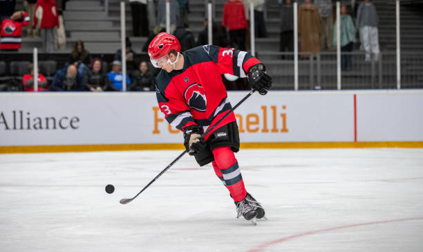 istock Ice Hockey Player in Action, Preparing to Shoot 2181463878