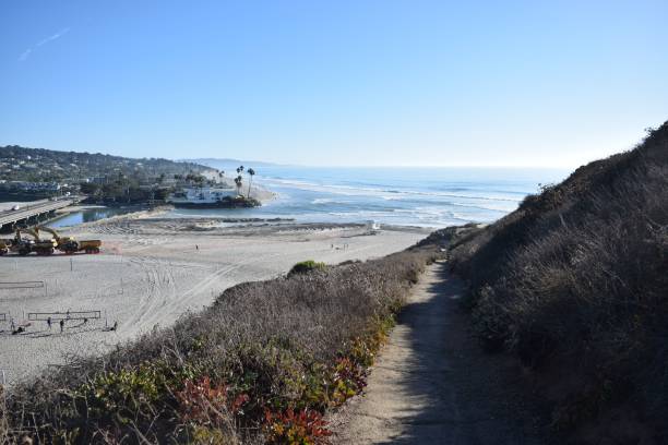 istock Scenic coastal beach with clear skies and ocean waves. 2181464681