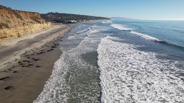 istock Aerial view of scenic coastline with cliffs and waves. 2181464720