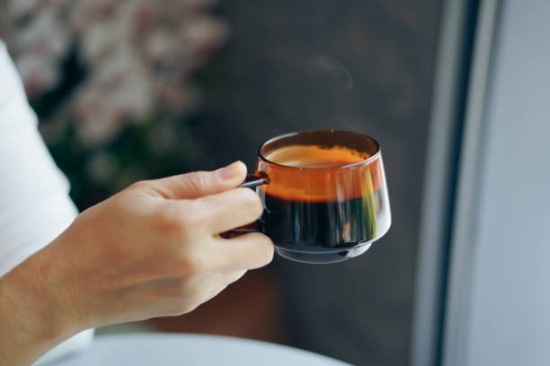 istock Close-up hand Woman holding a coffee cup 2181471798