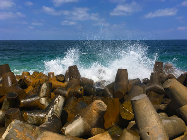 istock Sea and Modular concrete block ripraps or rock armours and medium wave 2181472221