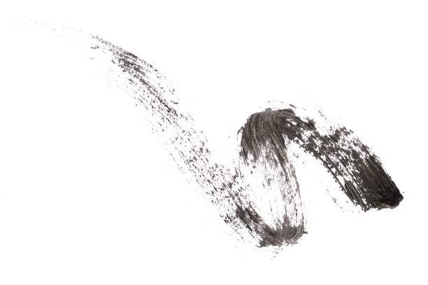 istock Black mascara brush strokes on background 2181472550