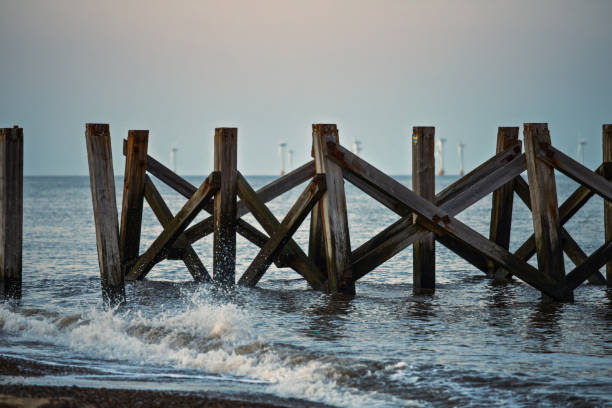 The beach and offshore platforms in Sizewell, Suffolk, England, UK