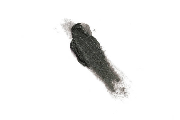 istock Smudged black color cosmetic on background 2181473204