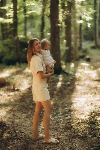 istock A mother and daughter walking in the forest 2181474802