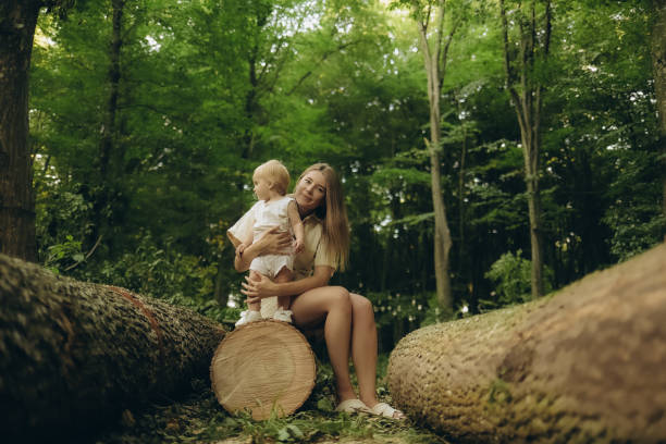 A happy family spending time and walking in the forest