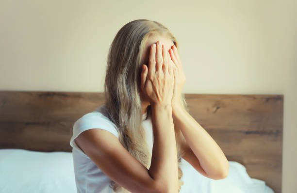 istock Upset sad crying woman while experiencing mental suffering, depression, fatigue, emotional stress 2181480424