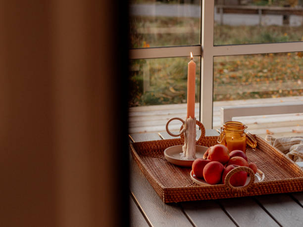 Autumn still life with apples and candles