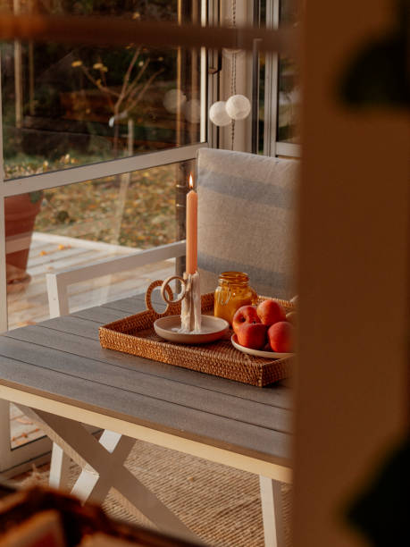istock Autumn still life with apples and candles 2181483491