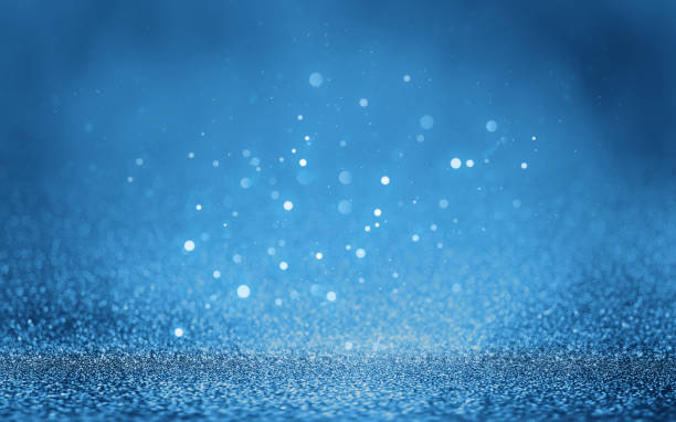 istock Shiny blue glitter texture background with blurred bokeh lights. Abstract festive background with soft focus. 2181484902
