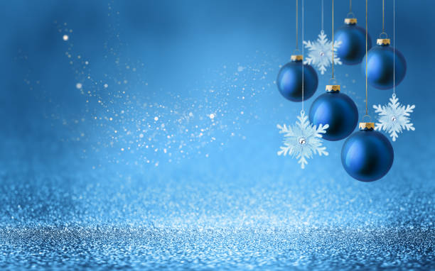 istock Christmas tree bauble and hanging snowflake on glitter blue background with bokeh light. Festive winter holiday decoration and ornament. 2181485060